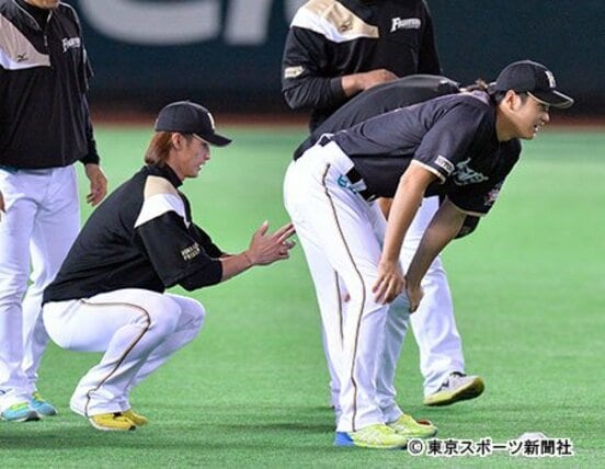 陽が大谷に気合の浣腸をしているように見えるが…