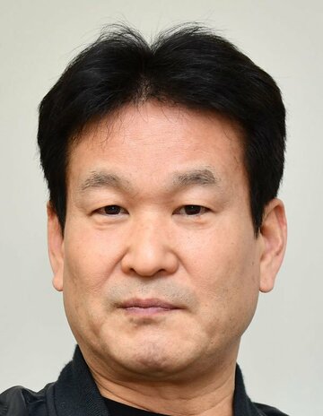  辛坊治郎氏