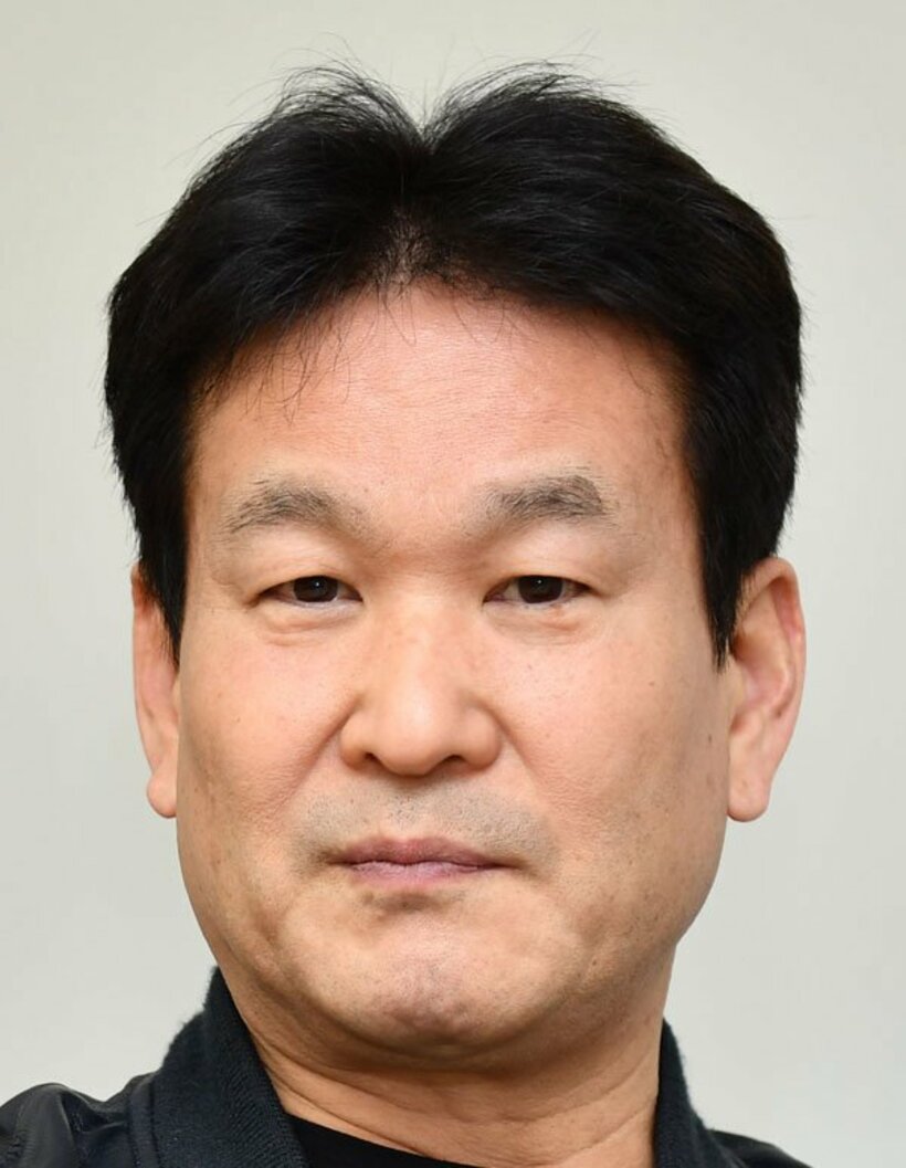  辛坊治郎氏