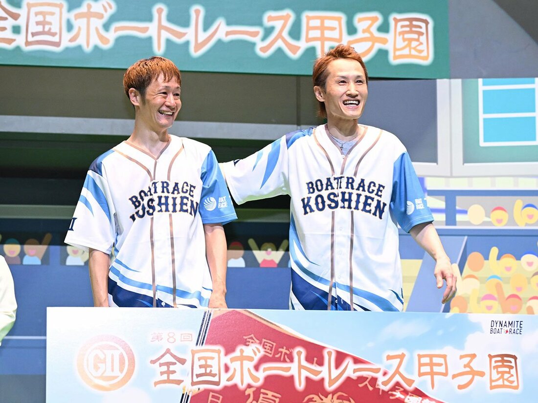 優勝した大峯豊(左)の応援に駆け付けた白井英治