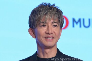 電車に乗らない男