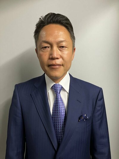 「再生の道」の西岡事務局長