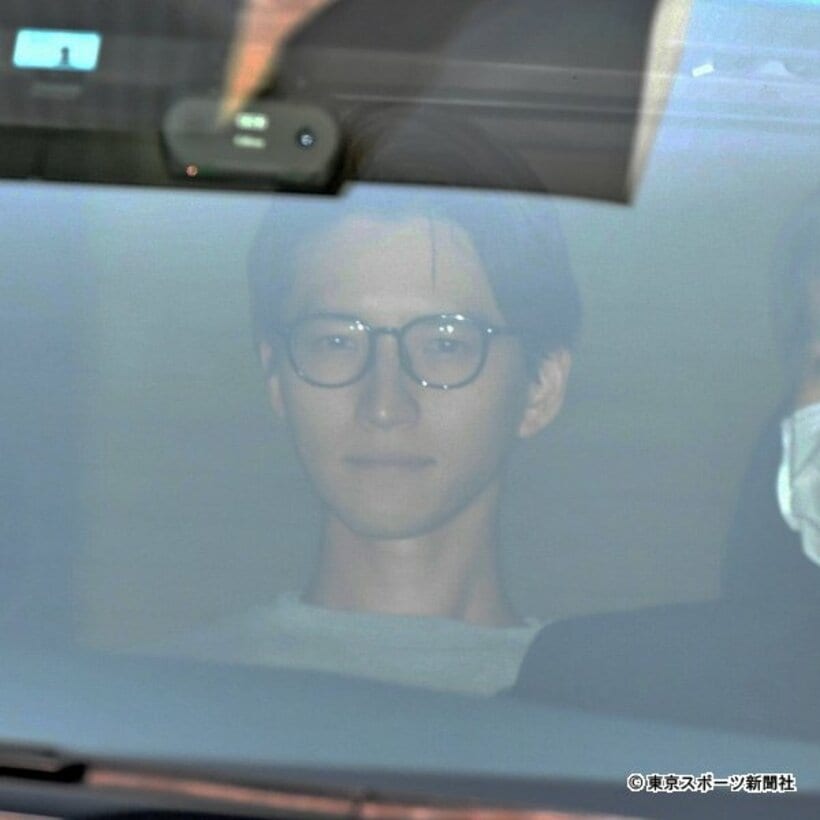  送検される田口容疑者