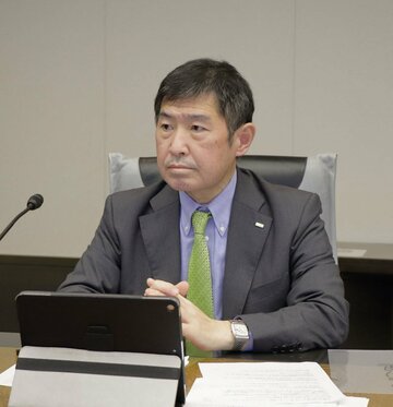  会見する虫明社長