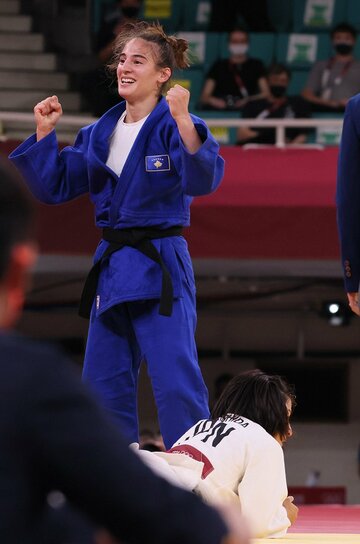  準決勝でジャコバ(左)に屈した芳田司