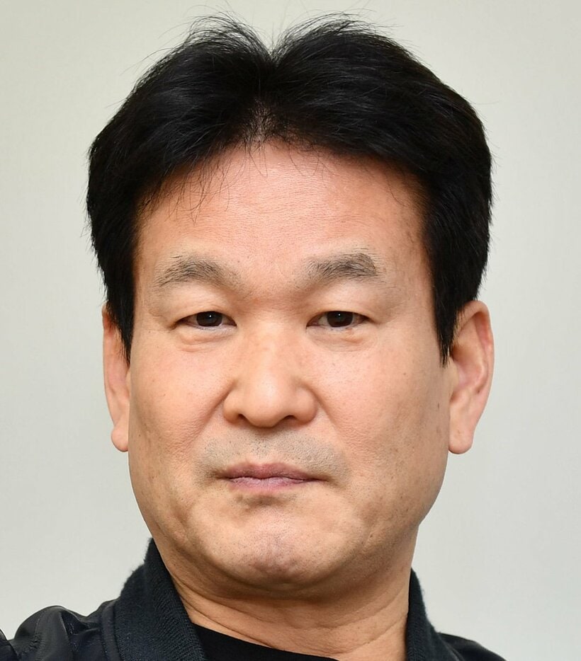  辛坊治郎氏