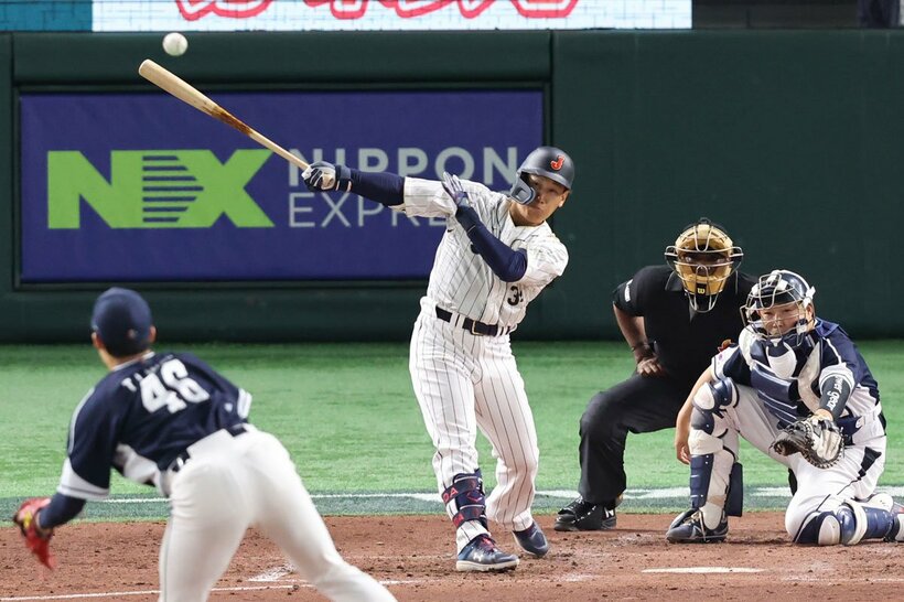 ３回に逆転打を放った吉田正尚