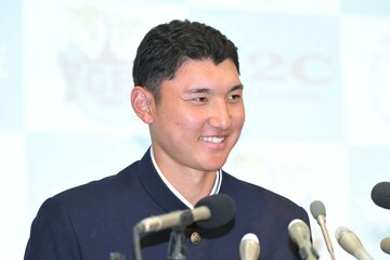 日本ハムから指名され笑顔を見せる菰田