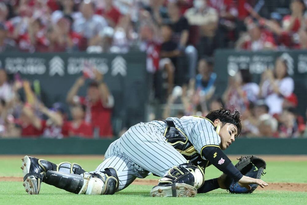 ８回裏、梅野が後逸して失点した