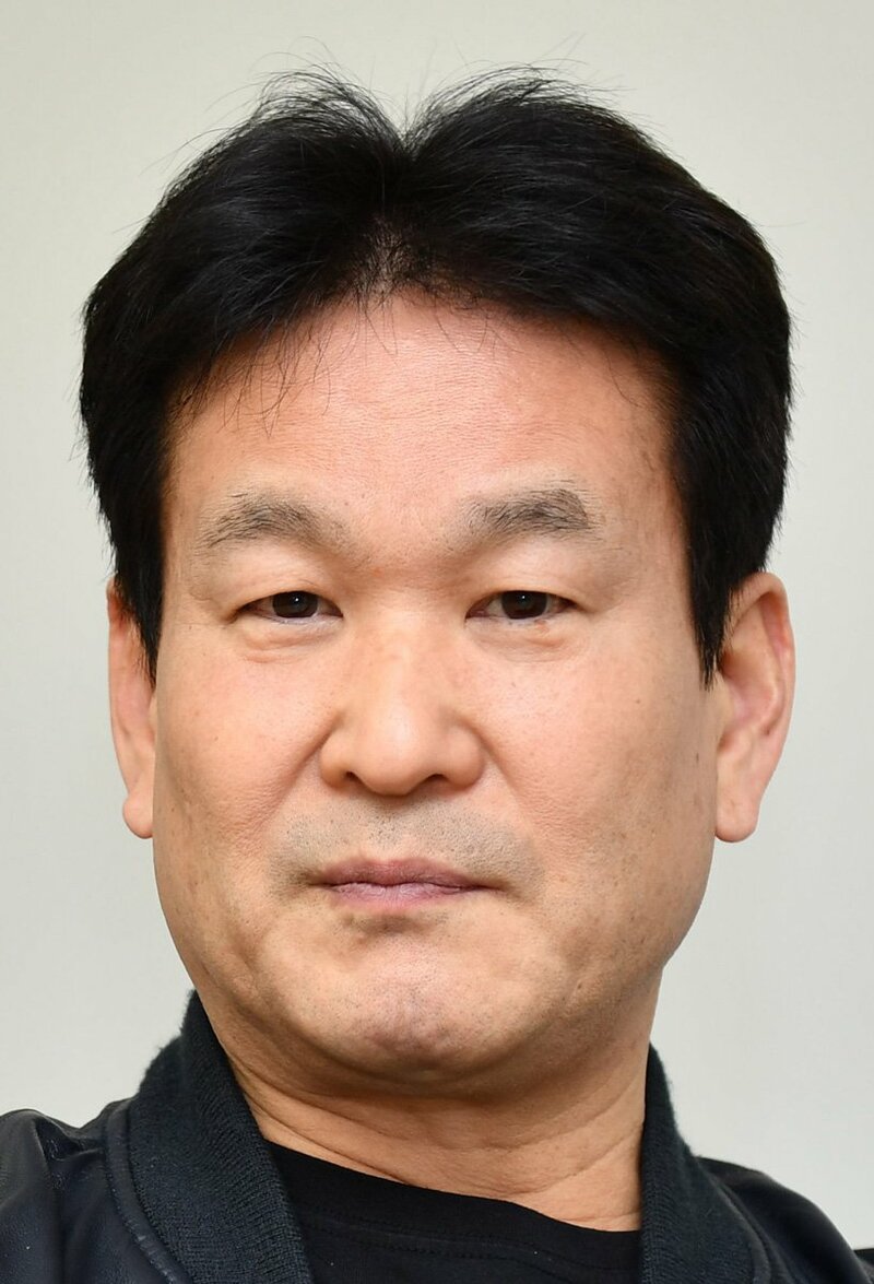  辛坊治郎氏