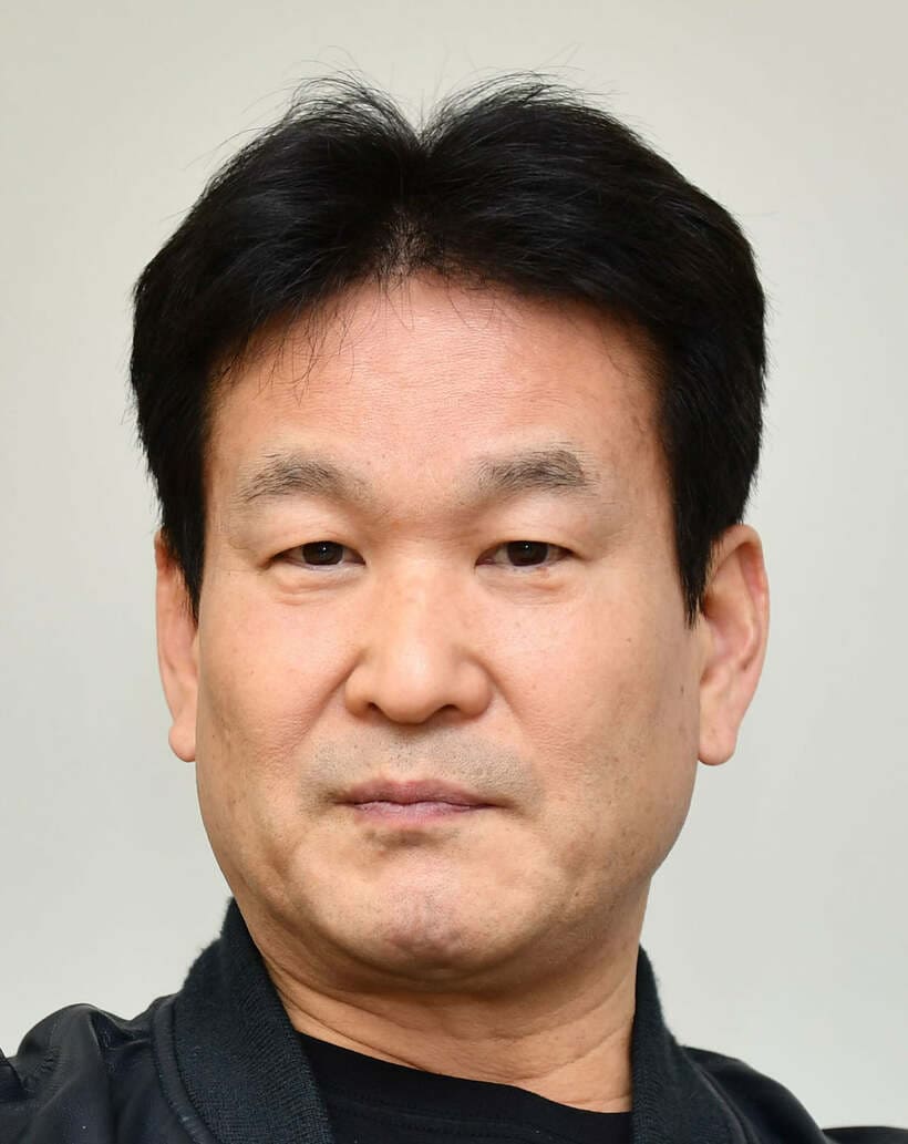  辛坊治郎氏