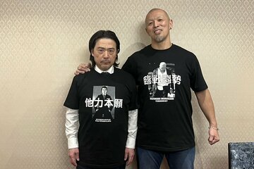 平井代表（左）に威圧的な言葉を投げかけた村上和成