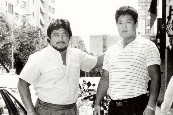 ジャパンプロレス入りした田上明。左は谷津嘉章(1987年8月)