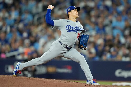 力投する山本由伸の視界にカーネルおじさんが？（ロイター）