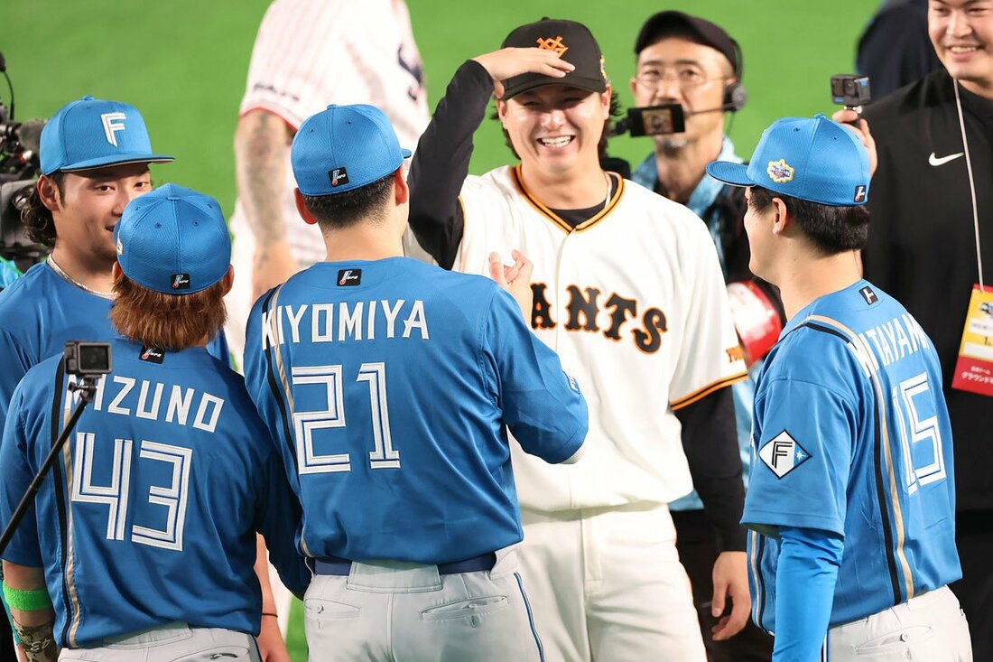 古巣・日本ハム勢と旧交を温める巨人・田中瑛斗(中)