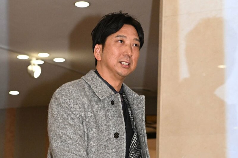 会場入りする藤川監督