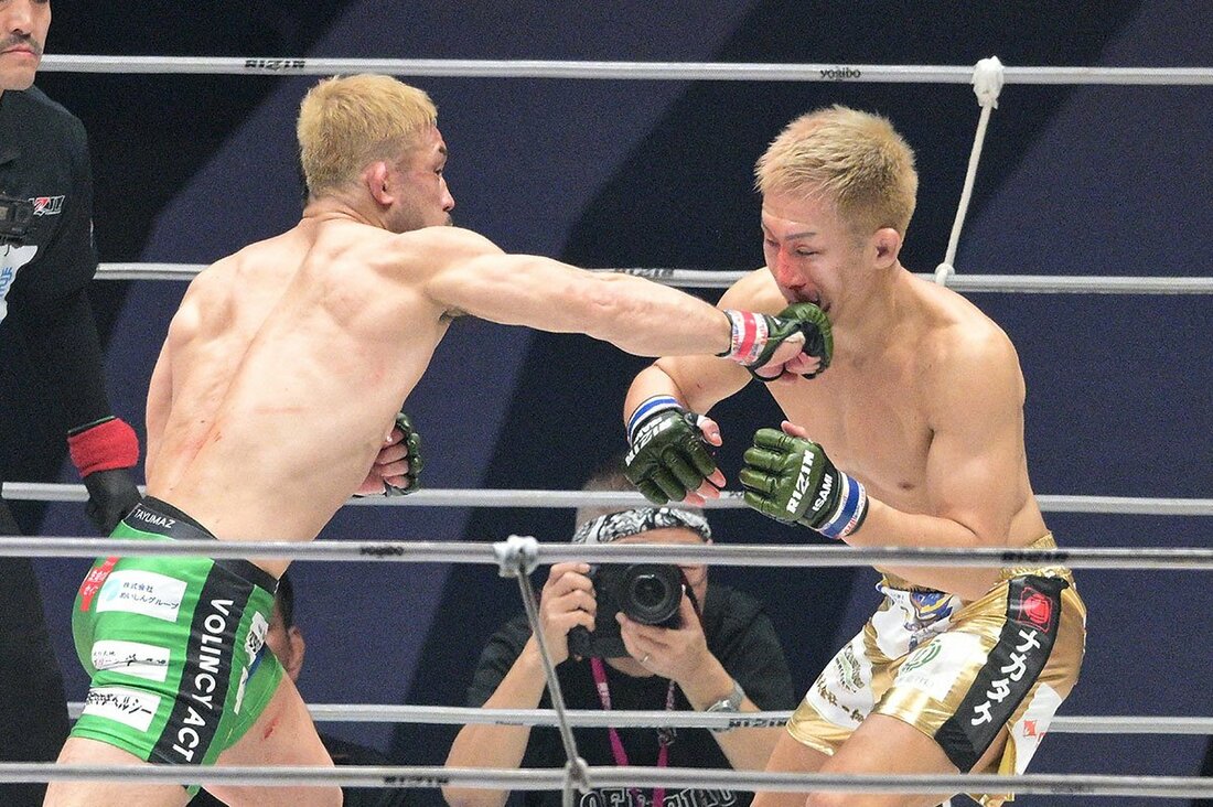 元谷友貴(右)の顔面を捉えた扇久保博正の「右」