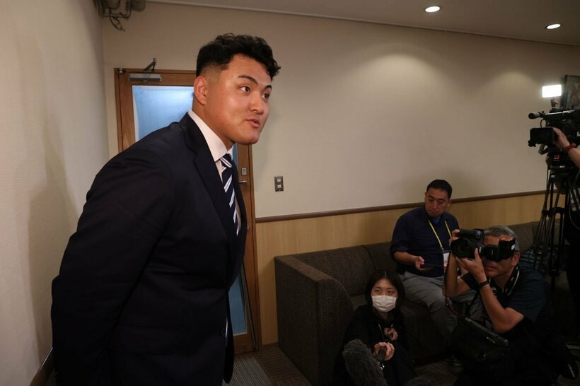 面談を終えて取材に応じた佐々木