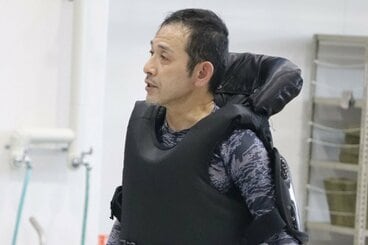 三角哲男